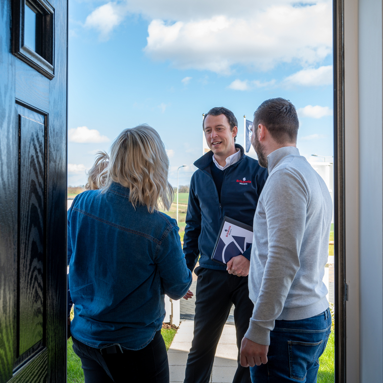 Bradshaw International of Manchester Removals & Storage team unloading household items at a new home in Greater Manchester.